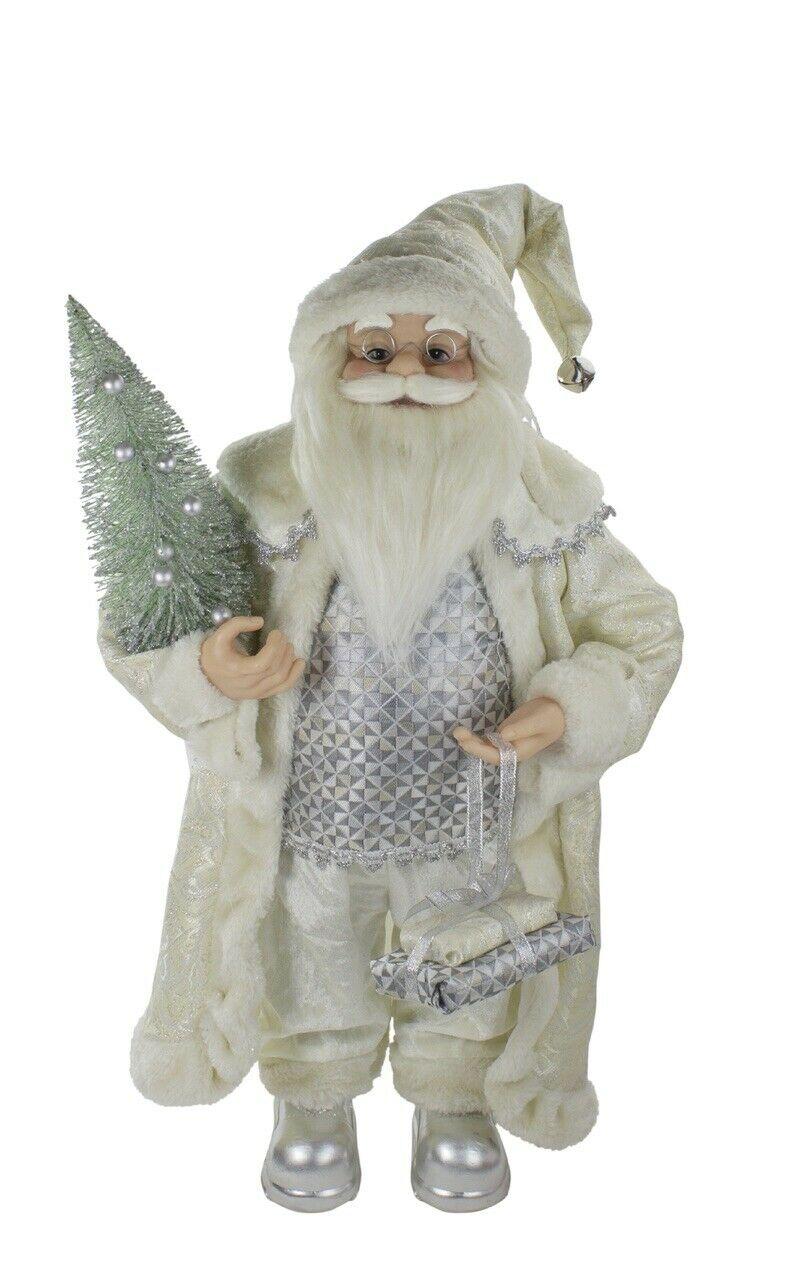 2' Standing Christmas Santa Figure Carrying a Green Pine Tree (cc)