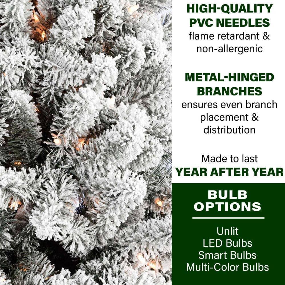 12 ft. Pre-Lit Flocked Akaskan Pine Artificial Christmas Tree with Clear LED Lighting