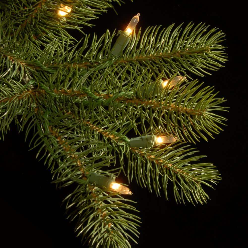 6-1/2 ft. Feel Real Downswept Douglas Fir Hinged Artificial Christmas Tree with 650 Clear Lights